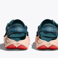 Pair of blue and red sneakers on a white background